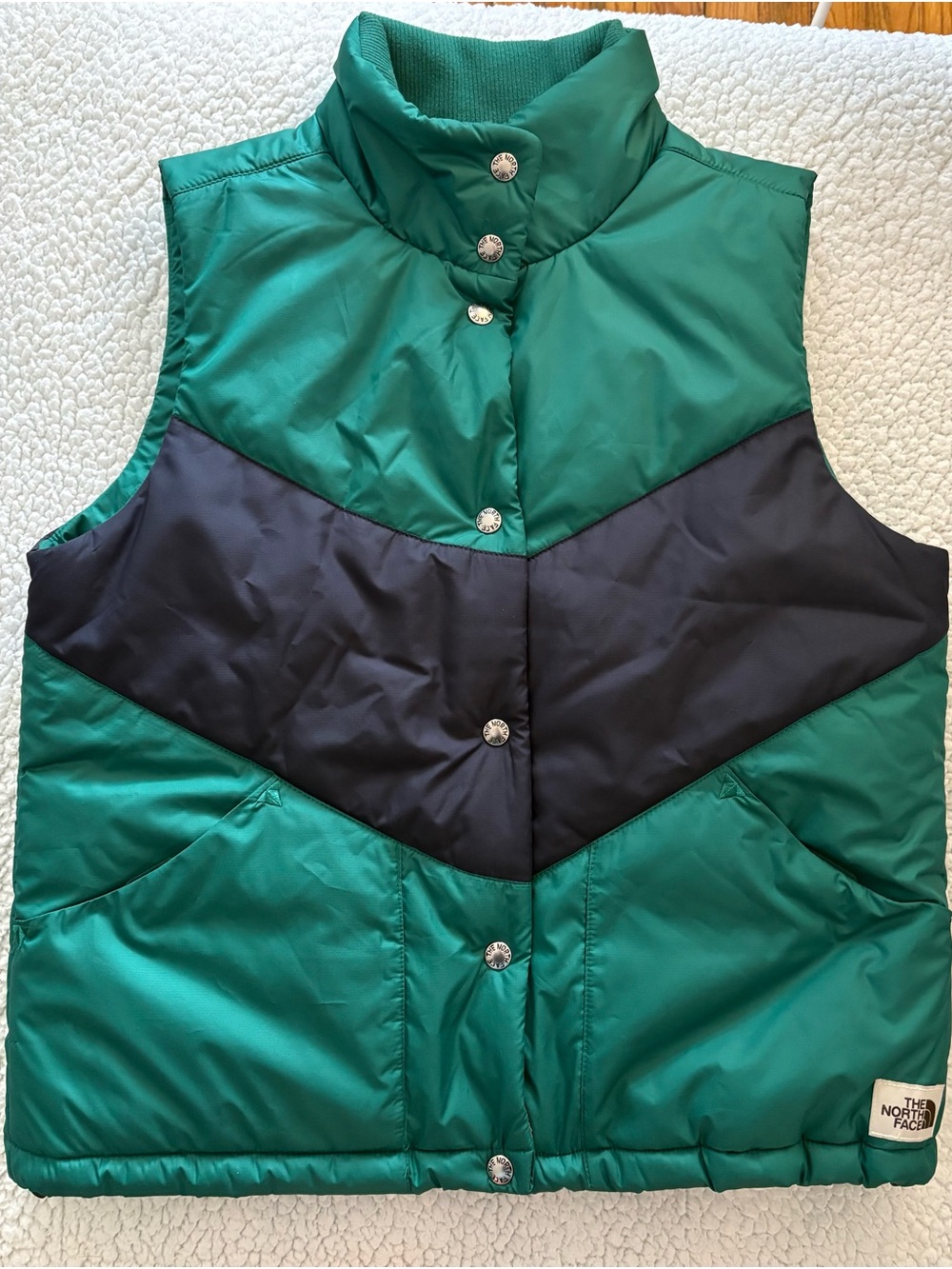 The North Face Teal and Black Chevron Puffer Vest Size M like new